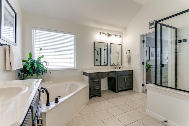 bathroom featuring plus walk in shower, vanity, a wealth of natural light, and lofted ceiling