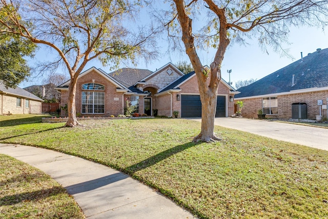 view of front of house featuring a garage, central air condition unit, and a front lawn