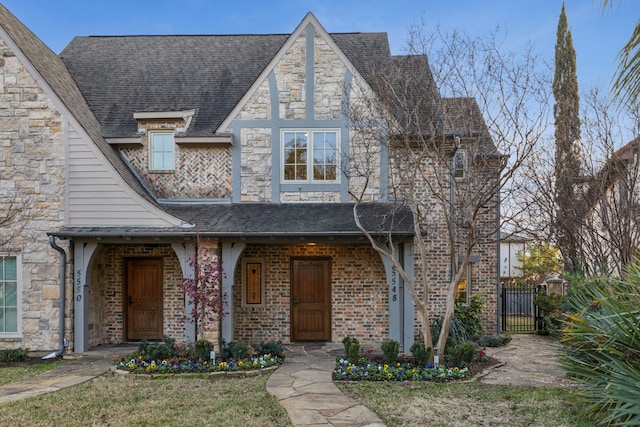 tudor house with covered porch