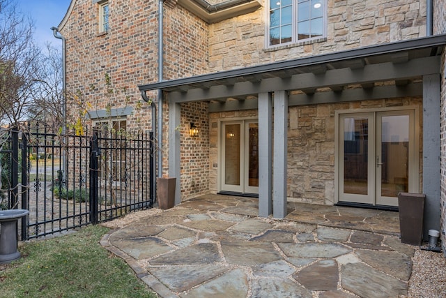 exterior space with french doors and a patio area