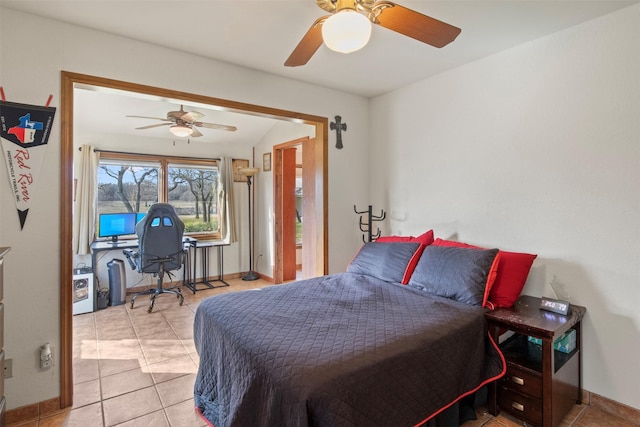 bedroom featuring ceiling fan and light tile patterned flooring