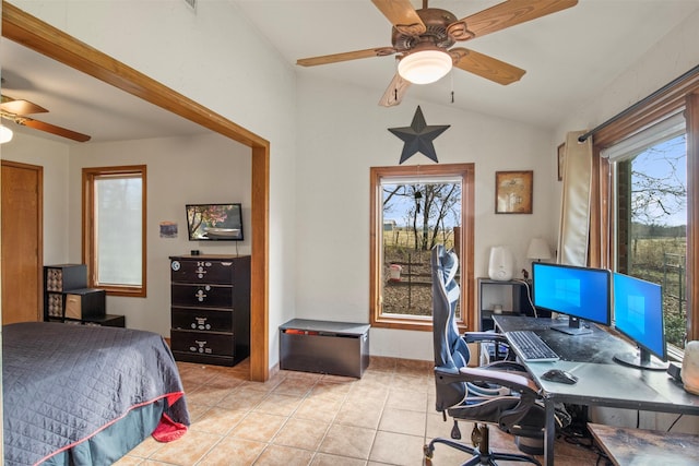 tiled bedroom featuring ceiling fan and vaulted ceiling