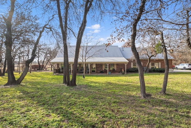 view of front of house with a front yard