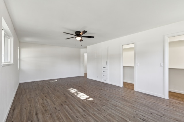 interior space featuring ceiling fan and dark hardwood / wood-style floors