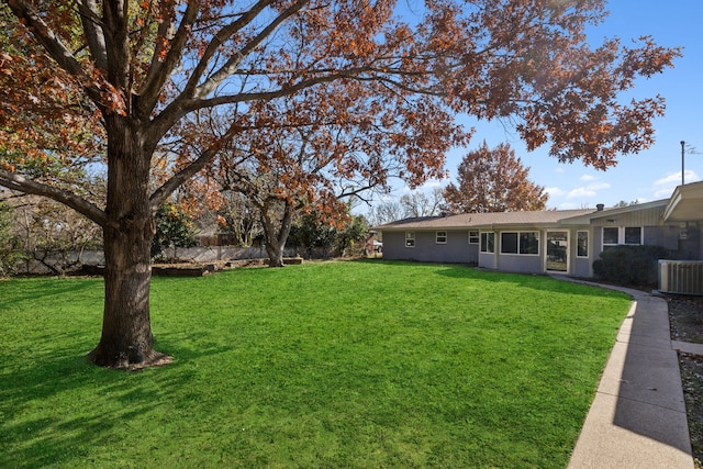 view of yard with central AC