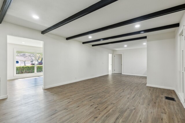 spare room with french doors and dark hardwood / wood-style floors