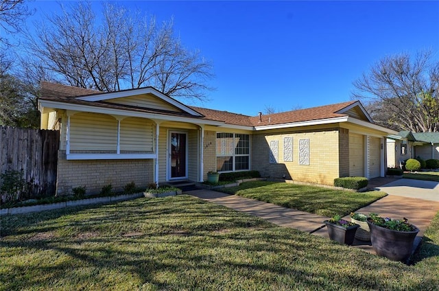 ranch-style house with a front lawn and a garage