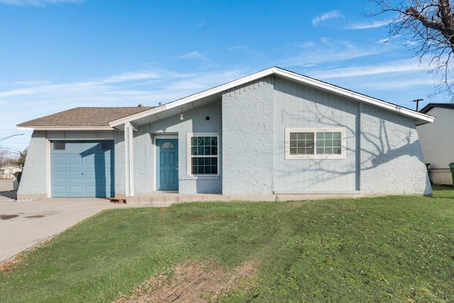 ranch-style home with a front lawn and a garage