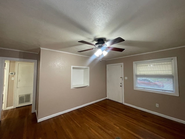 bonus room with a textured ceiling, ceiling fan, and dark wood-type flooring