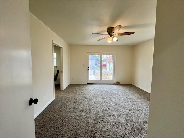 carpeted empty room with ceiling fan