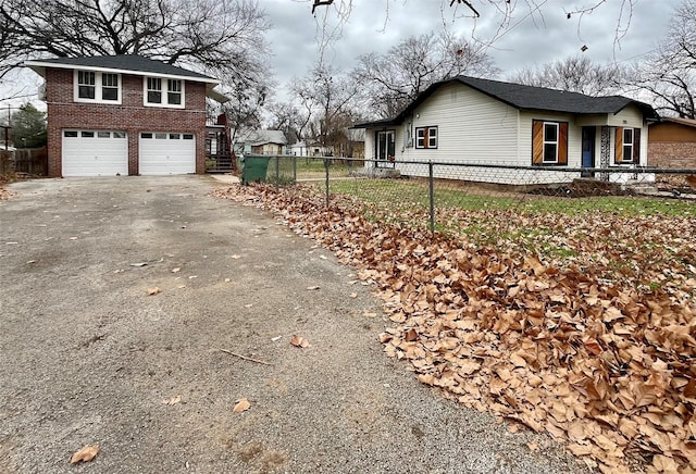 view of side of property with a garage