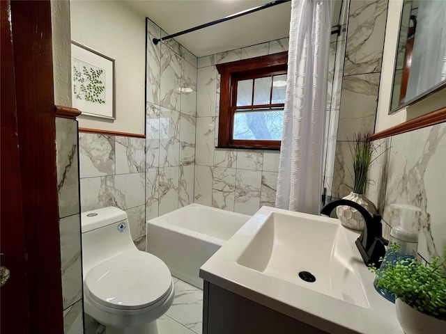 full bathroom with shower / bath combo, toilet, sink, and tile walls