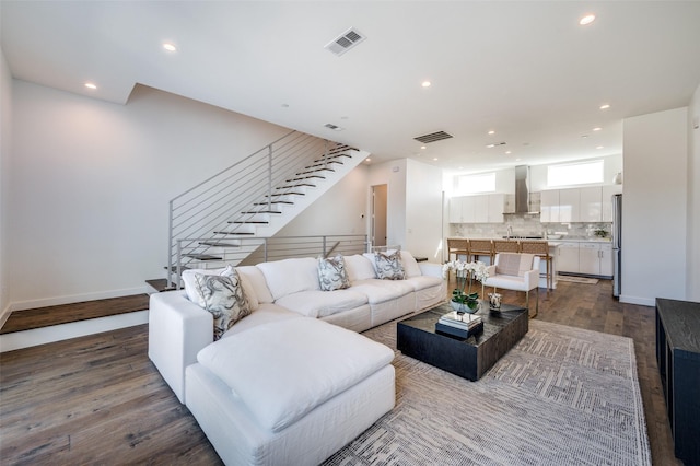 living room with hardwood / wood-style floors