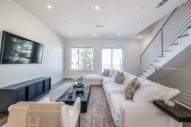 living room with dark hardwood / wood-style floors