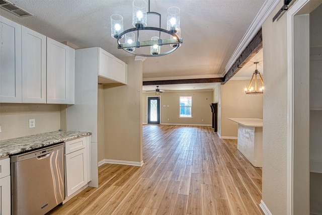 kitchen featuring white cabinetry, a barn door, dishwasher, ornamental molding, and ceiling fan with notable chandelier