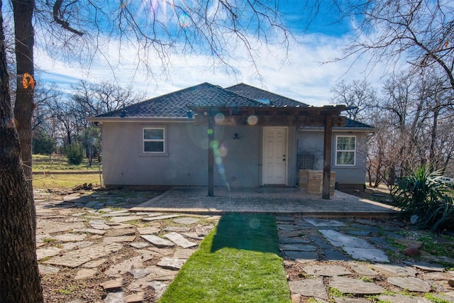 view of front of property featuring a patio area