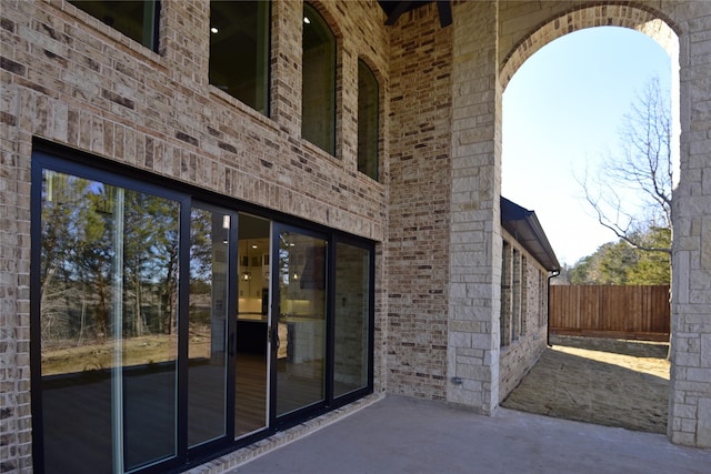 entrance to property with a patio