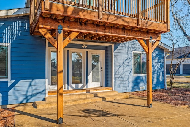 doorway to property with a patio area