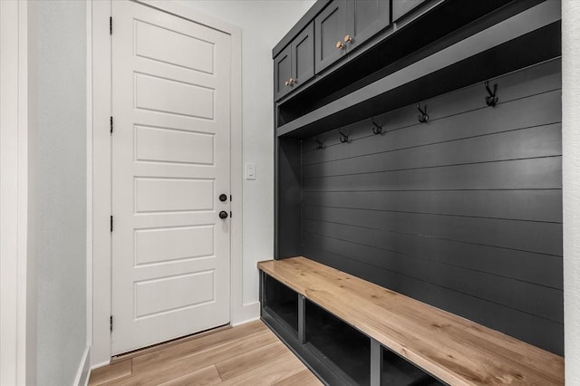 mudroom with light hardwood / wood-style floors