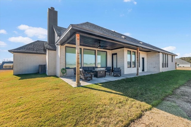 rear view of house with an outdoor living space, ceiling fan, a yard, central AC unit, and a patio