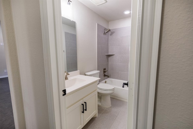 full bathroom with vanity, toilet, and tiled shower / bath