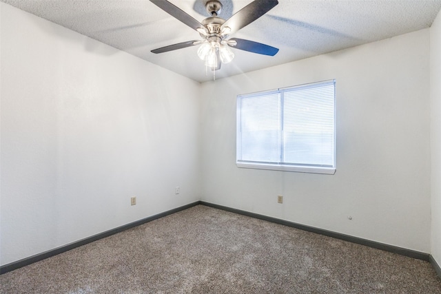 unfurnished room featuring carpet flooring, a textured ceiling, and ceiling fan