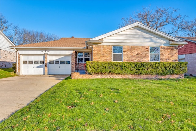 ranch-style home featuring a garage and a front lawn