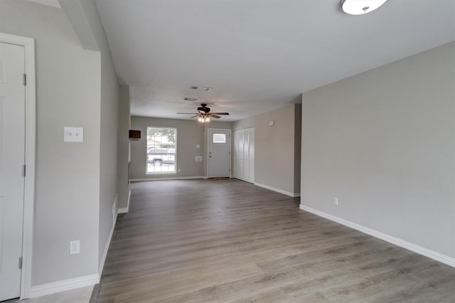 interior space featuring ceiling fan and light hardwood / wood-style flooring