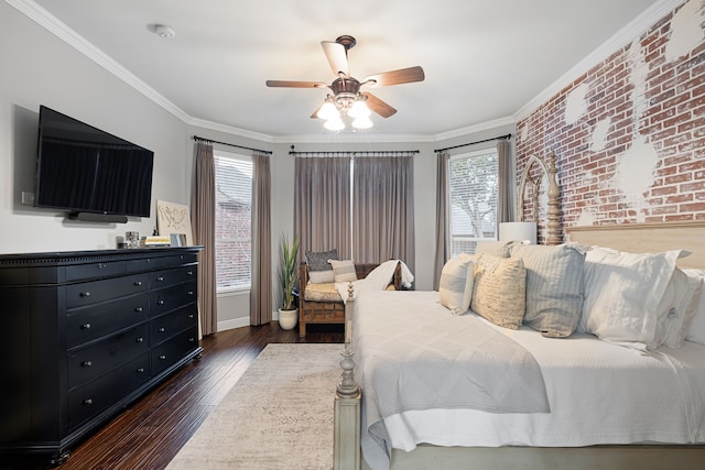 bedroom featuring ceiling fan, crown molding, dark hardwood / wood-style floors, and multiple windows