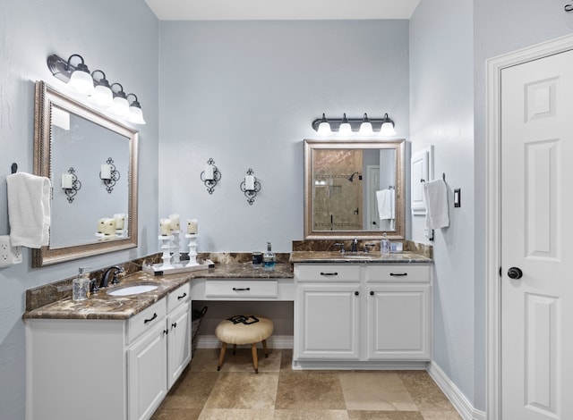 bathroom featuring vanity and a shower