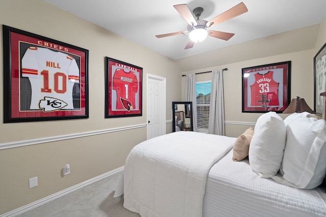 carpeted bedroom featuring ceiling fan