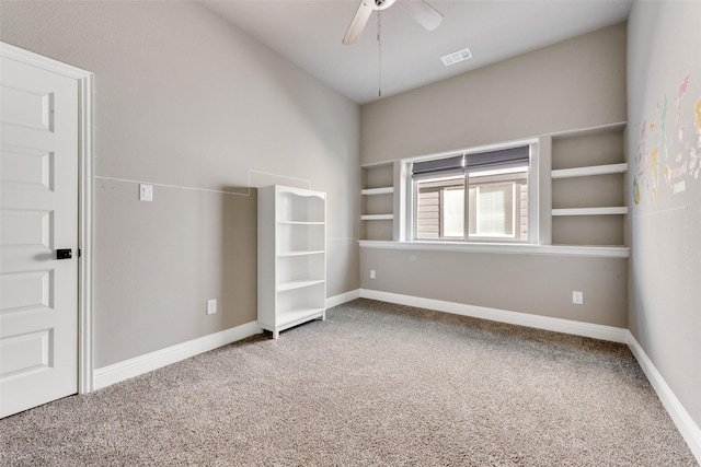 unfurnished bedroom with ceiling fan and carpet flooring