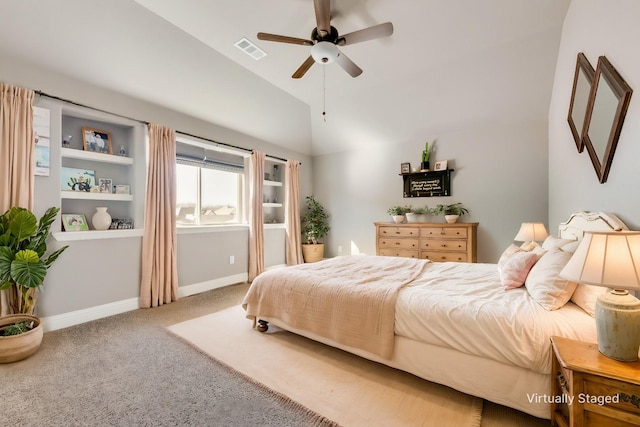 bedroom with vaulted ceiling, ceiling fan, and carpet flooring