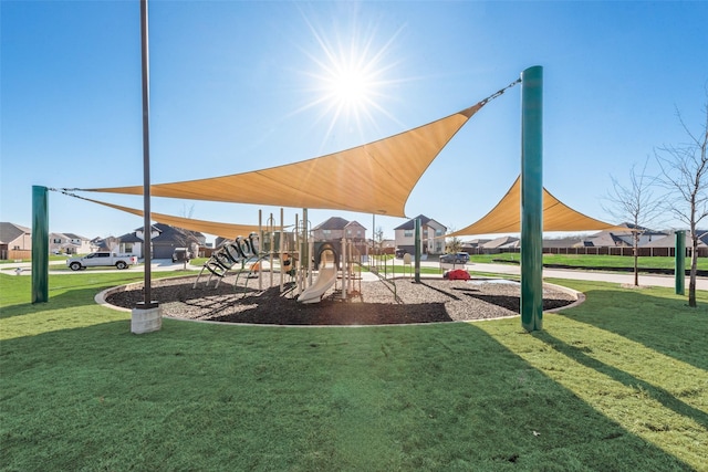 view of jungle gym with a lawn