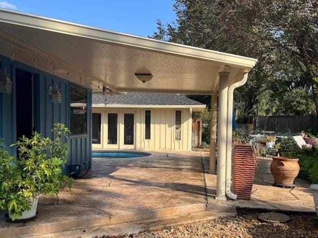 view of patio featuring a fenced in pool