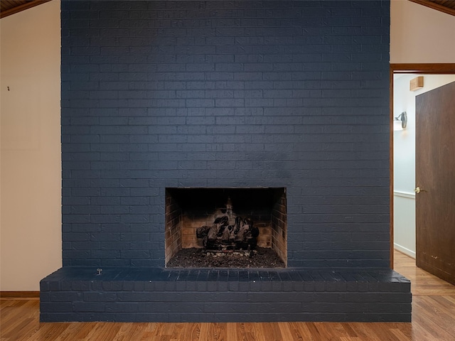 details with a fireplace and hardwood / wood-style floors