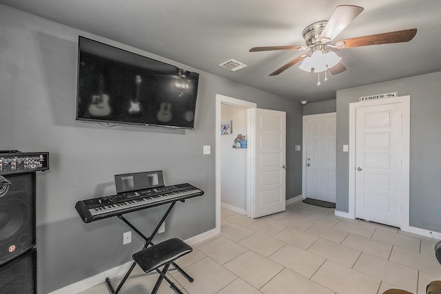 miscellaneous room featuring ceiling fan and light tile patterned flooring