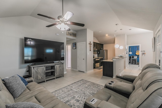 tiled living room with ceiling fan and lofted ceiling