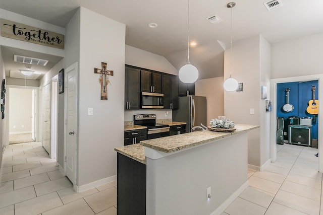 kitchen featuring light stone countertops, pendant lighting, stainless steel appliances, a kitchen island with sink, and light tile patterned floors