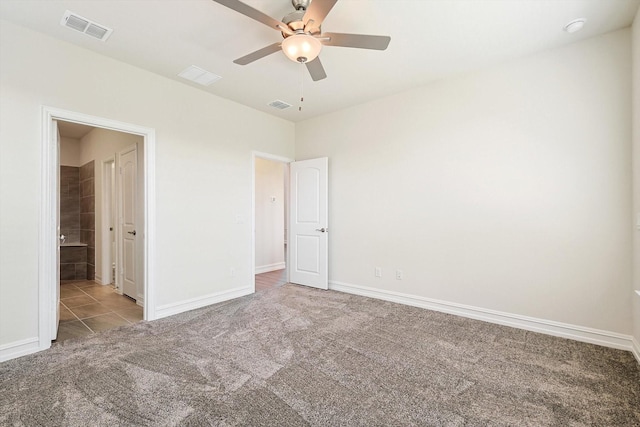 unfurnished bedroom featuring ceiling fan and light carpet