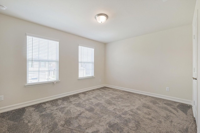 view of carpeted spare room