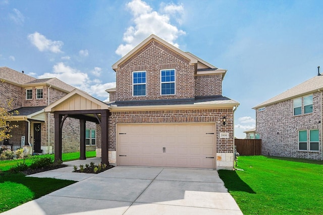 view of front of property featuring a front lawn and a garage