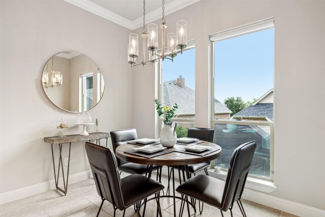 dining space featuring a notable chandelier, light tile patterned floors, and crown molding