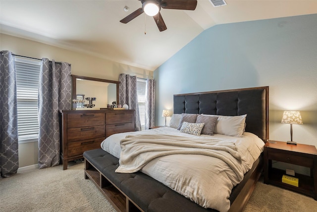 bedroom featuring ceiling fan, light carpet, and lofted ceiling