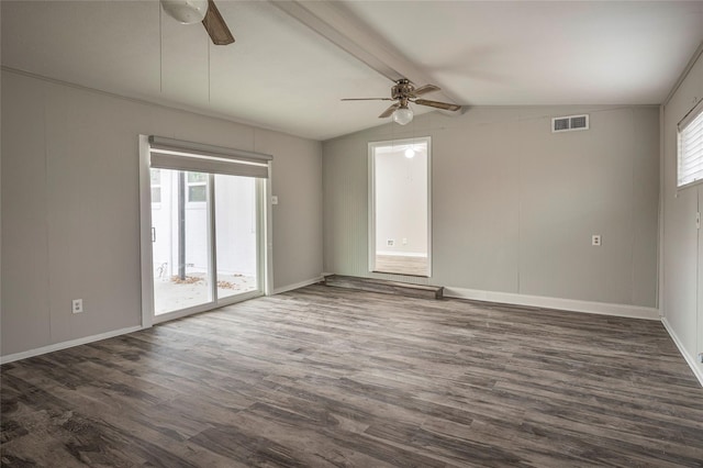 unfurnished room featuring lofted ceiling with beams, ceiling fan, and dark wood-type flooring