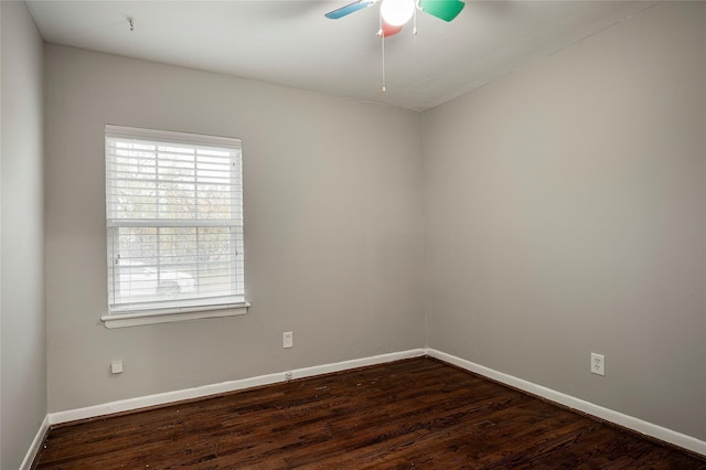 unfurnished room with ceiling fan and wood-type flooring