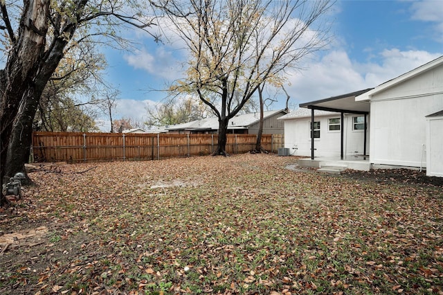 view of yard with central AC