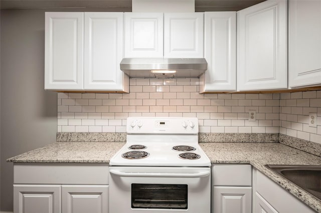 kitchen with white cabinets, electric stove, range hood, and tasteful backsplash