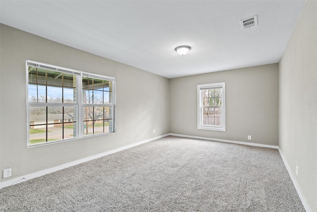 spare room with carpet flooring