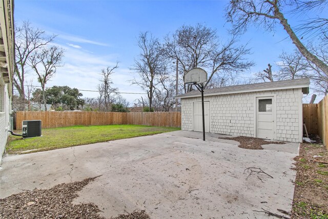 view of patio / terrace with an outbuilding and cooling unit